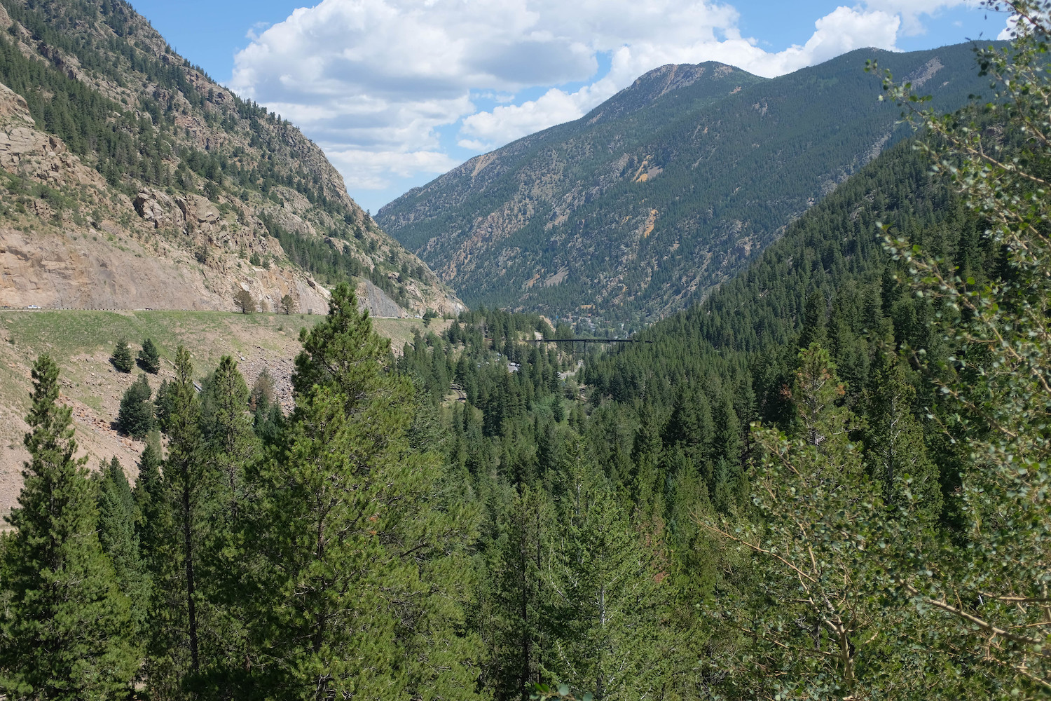 Spring landscape photography mountains and a bridge in the distance