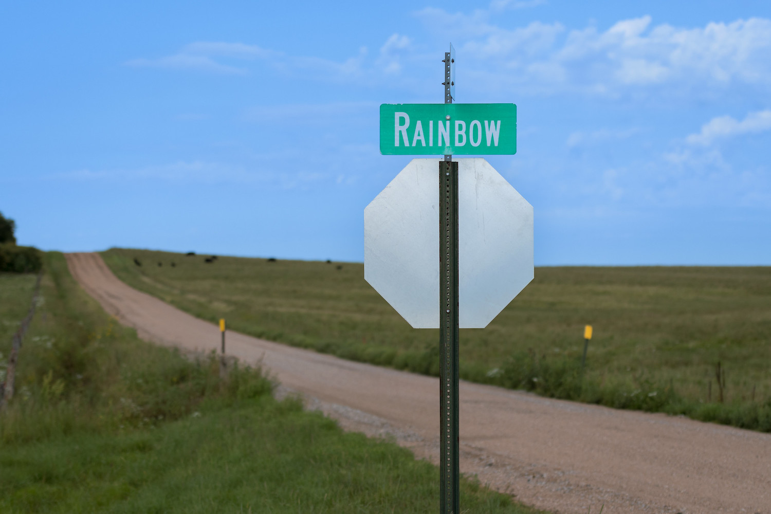Spring landscape photography rainbow road street sign