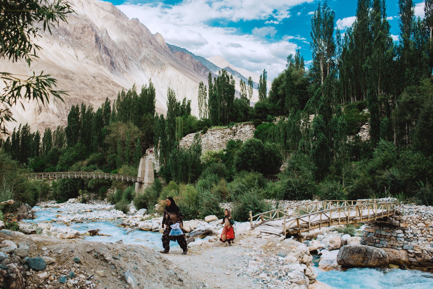 people walking in the mountains